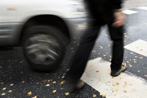 Car Striking Pedestrian At Crosswalk Stock Photo